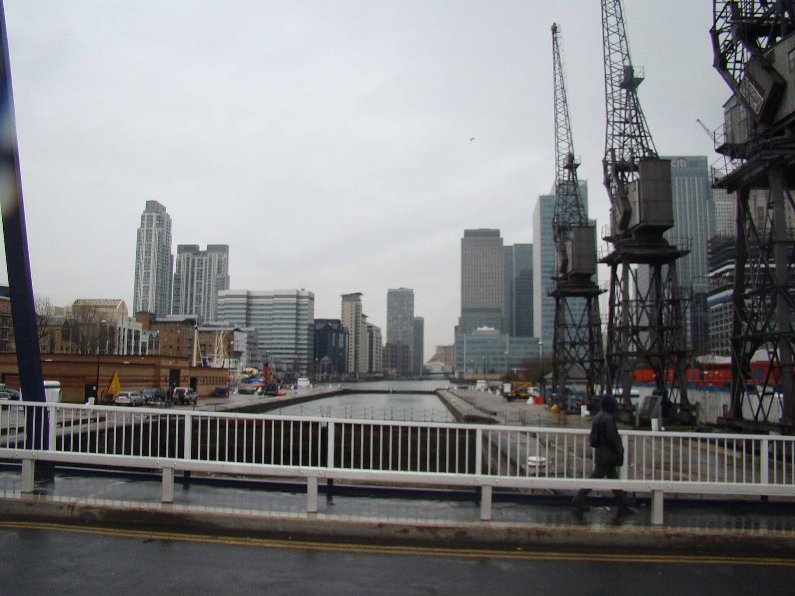 View across the dock from the Blue Bridge on Preston’s Road towards South Quay and the Canary Wharf towers, Isle of Dogs